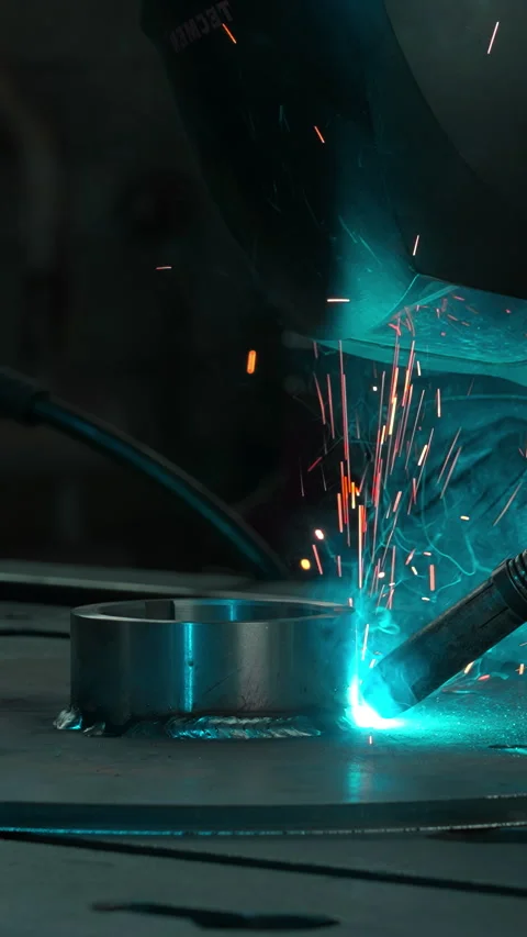 masked worker welding metal structures footage 283292584 iconl